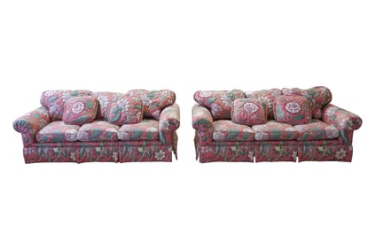 A Pair of Quilted Pink Floral Chintz Upholstered Sofas