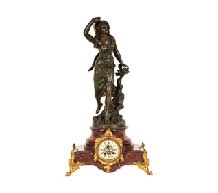 A French Patinated Metal and Rouge Marble Mantel Clock