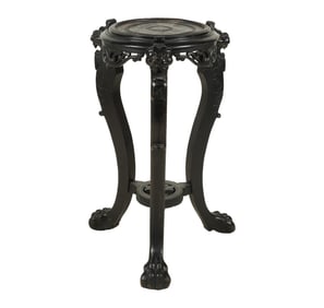 A Carved Ebonized Wood Plant Stand