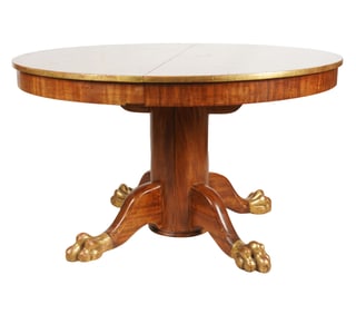 An American Walnut Round Pedestal Table