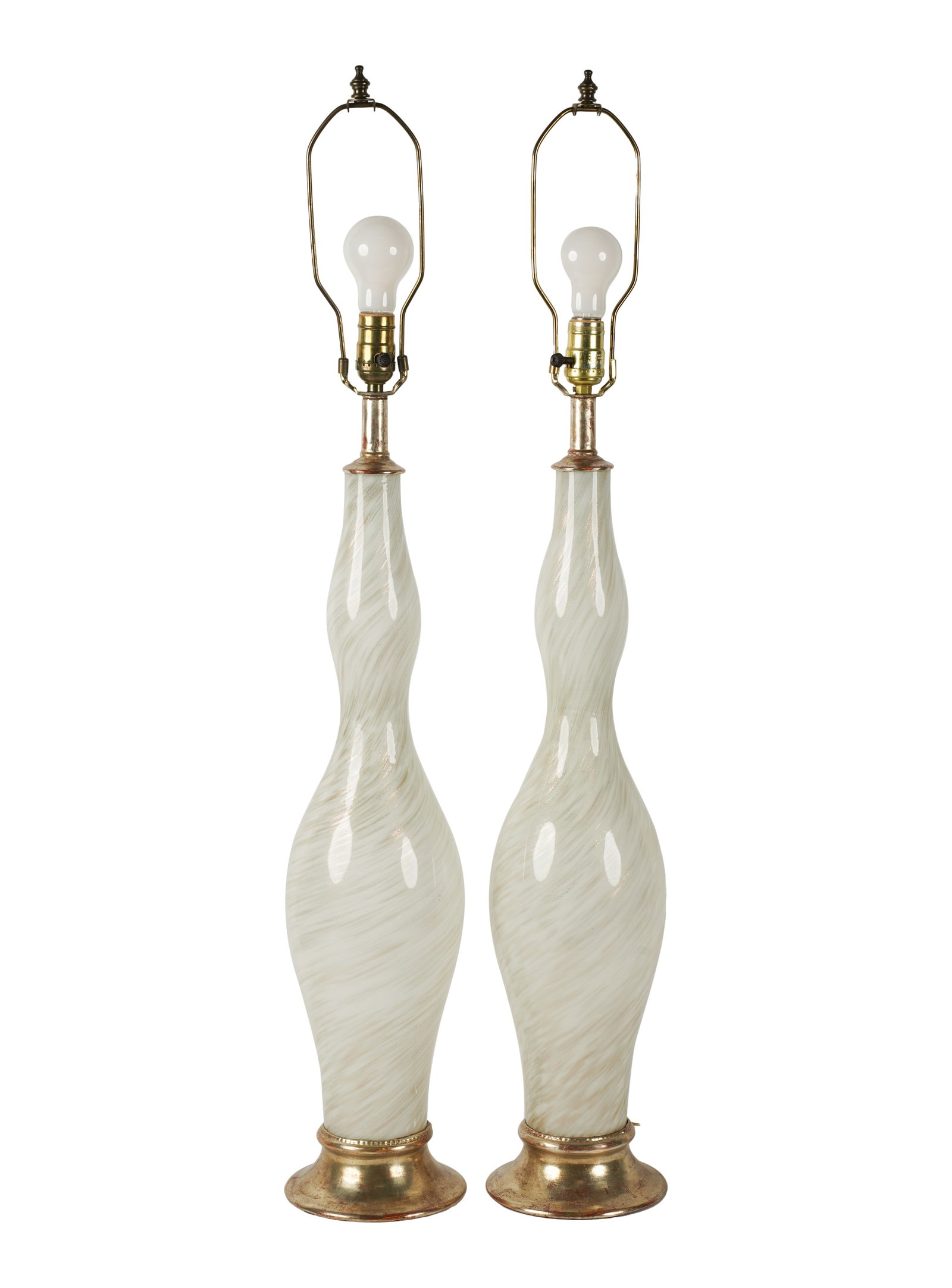 A Pair of Murano Glass Table Lamps: mid 20th centuryEach overall: 39 1/2 in. (100.3 cm.) highNotes: This item does not qualify for in-house shipping. Please see our preferred shippers' list for quotes or arrange for local pickup. https: