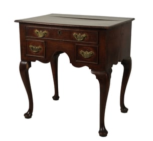 An Antique English Mahogany Lowboy