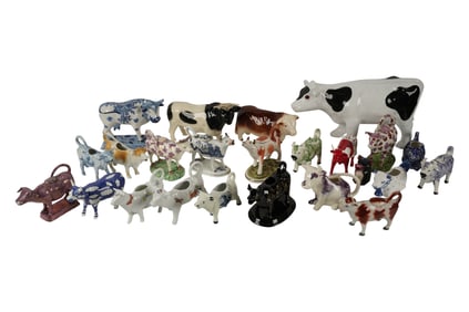 A Group of Porcelain Cows