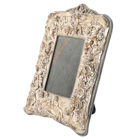 A Sterling Repousse Picture Frame
