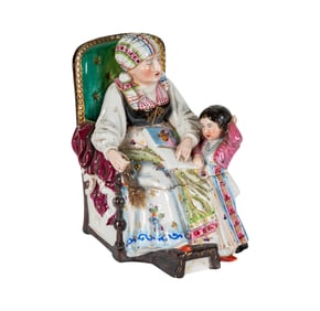 A German Painted Porcelain Figural Inkwell