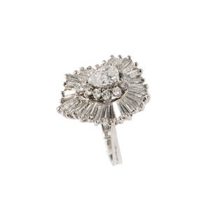 14-KARAT WHITE GOLD DIAMOND BALLERINA RING: featuring a center pear-shaped brilliant-cut diamond, approximately 0.75 carats, F-G-H color and I1 clarity (with possible laser drill holes), prong-set in 14-karat white gold with a halo of 12 round