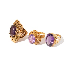 THREE 18-KARAT AND 14-KARAT YELLOW GOLD AMETHYST RINGS