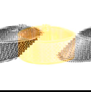 18-KARAT YELLOW, WHITE AND ROSE GOLD WIDE SCALE BRACELET: featuring a wide bracelet with a scale motif comprised of 14-karat yellow, white and rose gold, 7.5" long x 1.0" wide, 74.9 grams; inscribed 18kt