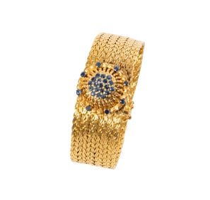 18-KARAT YELLOW GOLD MINIATURE SAPPHIRE COVERED WATCH, TISSOT
