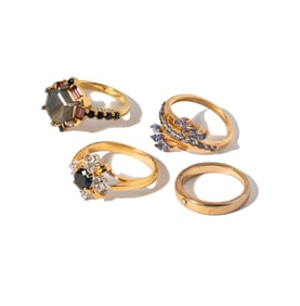 FOUR STERLING SILVER/COSTUME RINGS