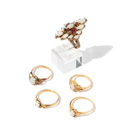 GROUP OF FIVE YELLOW GOLD OPAL RINGS