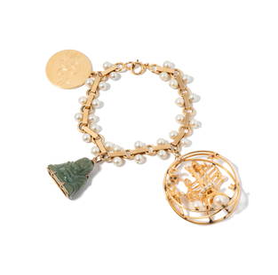 14 KARAT YELLOW GOLD PEARL CHARM BRACELET: featuring a 14-karat yellow gold pearl charm bracelet with an engraved pendant measuring 25.40 mm; bracelet 7-1/4" long by 12.35 mm wide; 46.5 grams