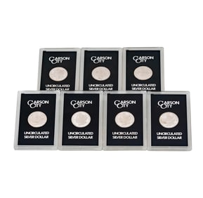 SEVEN 1884 MORGAN SILVER DOLLARS