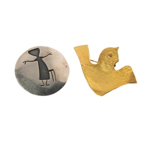 ONE STERLING AND ONE 18 KARAT GOLD DOVE BROOCH