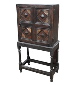 A Jacobean Oak Cabinet on Stand