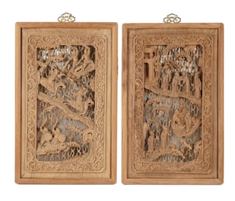 A Set of Four Chinese Carved and Pierced Wood Panels