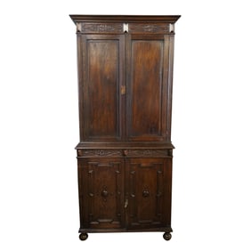 A Carved Oak Cabinet