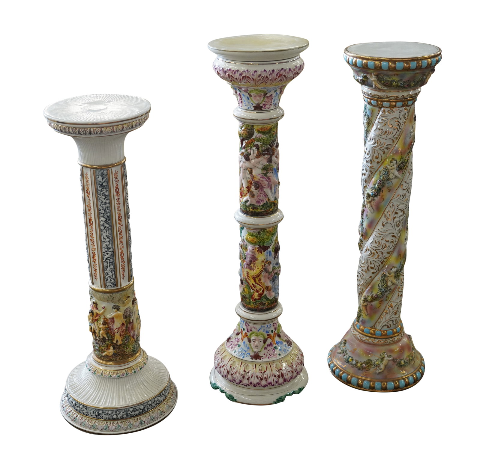 Three Capodimonte Porcelain Pedestals: 20th century; the first: painted "Capodimonte" and "Made in Italy" (40 x 11 in.); the second: painted "1425 Capodimonte Italy" (38 1/2 x 11 in.); the third: with printed backstamp "G.B. [shield] R. Ca