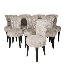 A Set of Eight Ebonized Dining Chairs