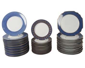 A Group of Mottahedeh Porcelain Chargers and Dinner Plates
