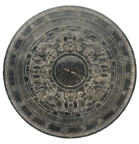 A Chinese Incised Mirror