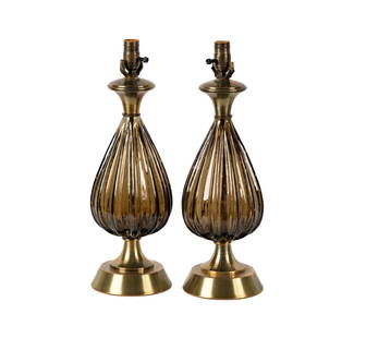 A Pair of Murano-Style Glass and Brass Table Lamps: 1980s; dark brown glass with controlled bubblesOverall: 20 x 7 in. (50.8 x 17.8 cm.)Notes: This item does not qualify for in-house shipping. Please see our preferred shippers' list for quotes or arran
