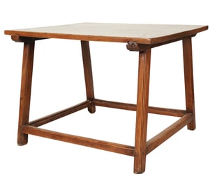 A Spanish Walnut Single-Plank Library Table