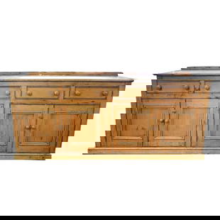 An English Pine Dresser / Sideboard: with drawers and doors36 1/4 x 25 x 85 in. (92.1 x 63.5 x 215.9 cm.)Notes: This item does not qualify for in-house shipping. Please see our preferred shippers' list for quotes or arrange for local pic