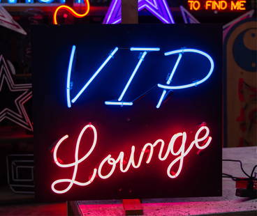 VIP Lounge Neon Sign: blue and pink neon mounted to wood black board; transformer included; 26 x 28 in. (66 x 71.1 cm.); Notes: This neon sign was featured in several television productions, including the pilot for LA Crim
