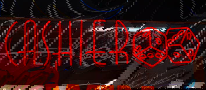 Red Neon Cashier Sign: mounted to plexiglass backing; transformer included; copy and paste link to view a video of this and other pieces: https://youtu.be/naR4sIs-dio ;14 x 47 in. (35.6 x 119.4 cm.)