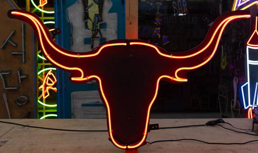 Red Neon Bull: mounted to black wood board backing; transformer included; 29 1/2 x 48 in. (74.9 x 121.9 cm.); Notes: This neon sign was featured in several notable film and television productions, including Bunk'd a