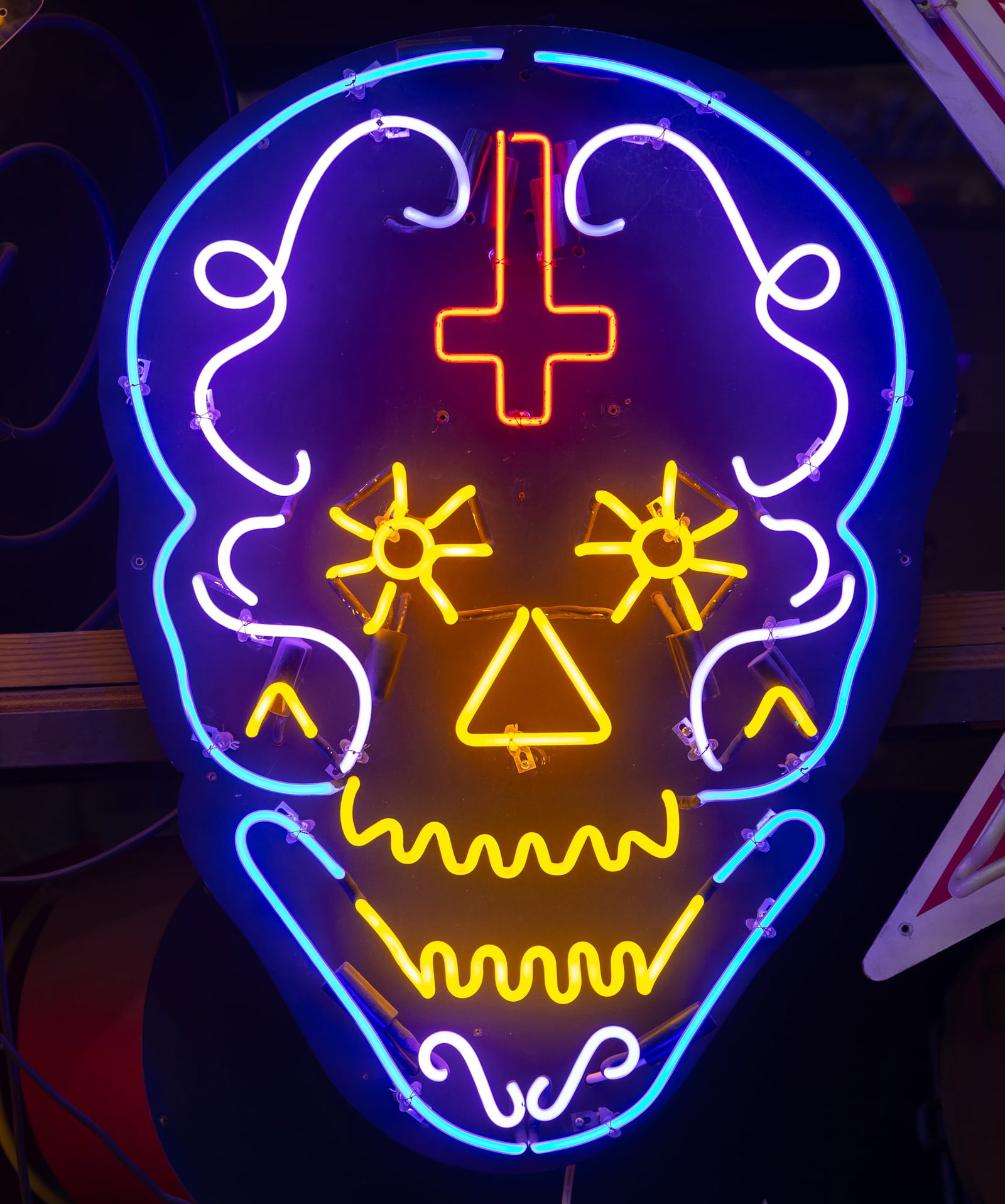 Multi-Color Skull Neon Sign: mounted to a black wood backing; with transformer; copy and paste link to view a video of this and other pieces: https://youtu.be/naR4sIs-dio; Overall: 33 x 23 in. (83.8 x 58.4 cm.); Notes: This neon