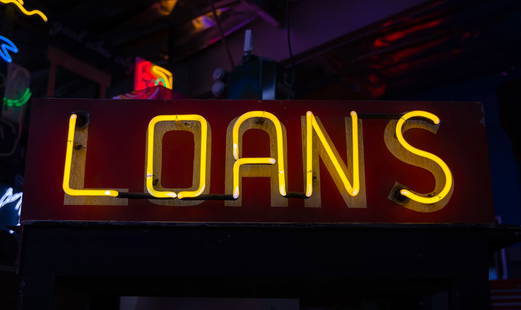 Vintage Loan Neon Sign: circa 1970s, single-sided neon sign set on galvanized steel box; transformer included inside; 11 x 42 x 10 in. (27.9 x 106.7 x 25.4 cm.); Notes: This neon sign was featured in several notable film and