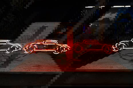 Two Cars Neon Sign: mounted to plexiglass backing; transformer included; 6 x 40 1/4 in. (15.2 x 102.2 cm.); Notes: This neon sign was featured in several notable film and television productions, including Motor Trend pro
