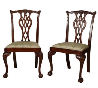 A Pair of Chippendale-Style Carved Mahogany Side Chairs