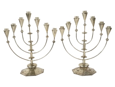 A Pair of William Spratling Tin Seven-Light Candelabra