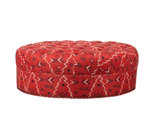 An Upholstered Round Ottoman