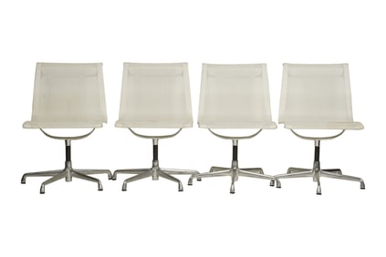 Four Eames Office Chairs