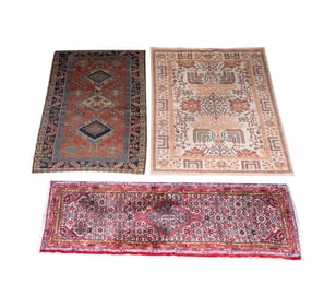 Three Persian-Style Rugs