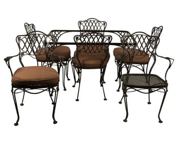 A Wrought Iron Patio Dining Set