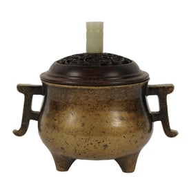 A Chinese Bronze Covered Censer