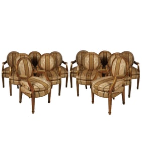 A Set of Twelve Armchairs