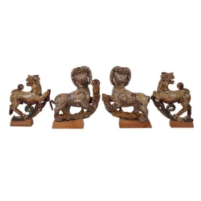 Four Carved Wood Figures of Mythical Beasts