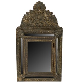A Dutch Repousse Gilt Metal Cushion Mirror
