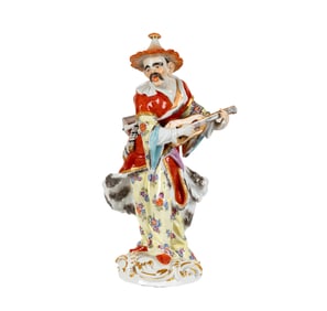 A Meissen Porcelain Figure of a Guitar Player