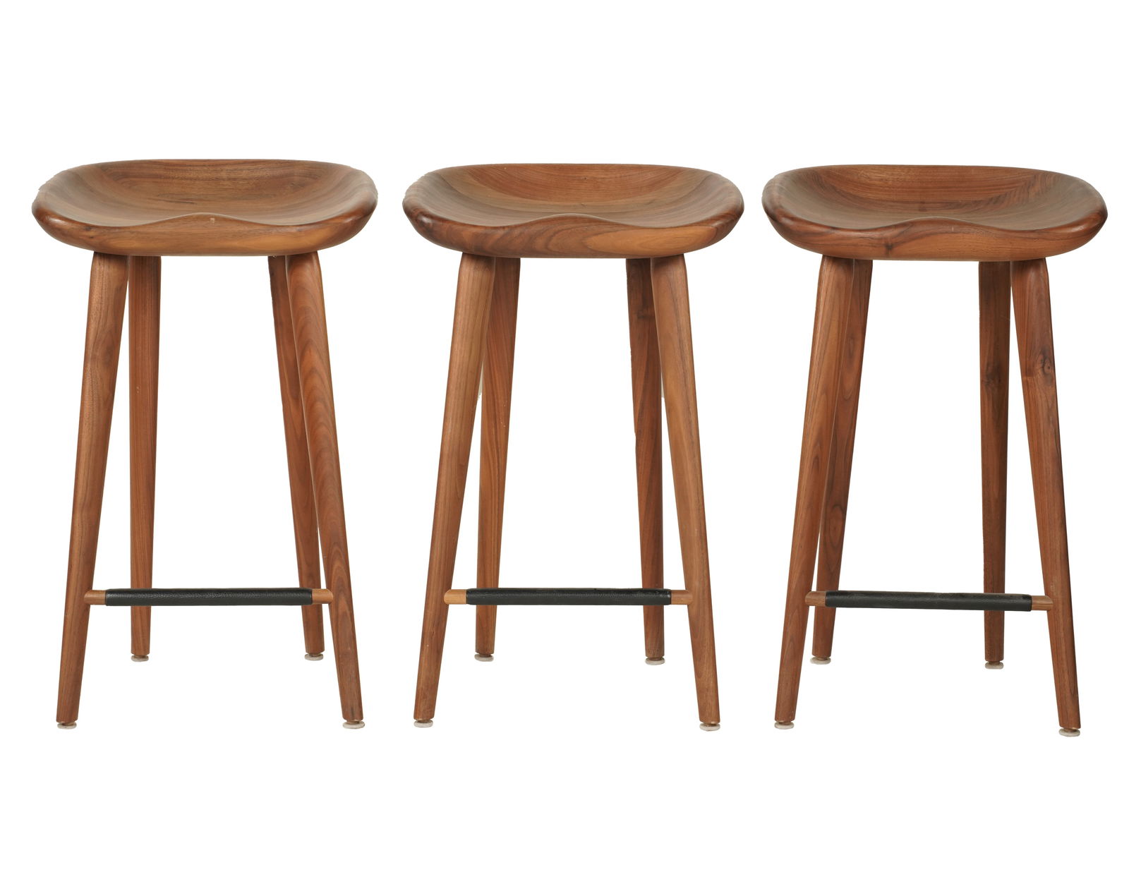 Three Bassam-Fellows CB-22 Tractor Bar Stools: with branded manufacturer's label 27 x 17 x 13 in. (68.6 x 43.2 x 33 cm.) Seat height: 25 in. (63.5 cm.) Notes: This item does not qualify for in-house shipping. Please see our preferred shippers' lis