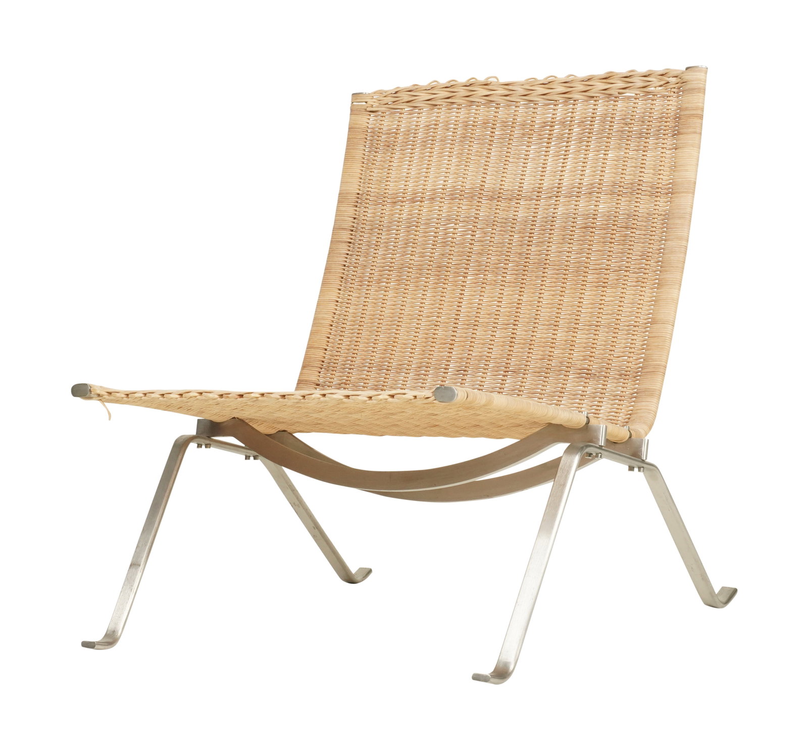 A Lounge Chair in the Style of Poul Kjaerholm: metal, woven rattan 28 x 24 1/2 x 23 1/2 in. (71.1 x 62.2 x 59.7 cm.) Seat height: 13 in. (33 cm.) Notes: This item does not qualify for in-house shipping. Please see our preferred shippers' list for 