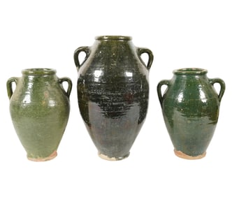 Three Green Glazed Earthenware Jars