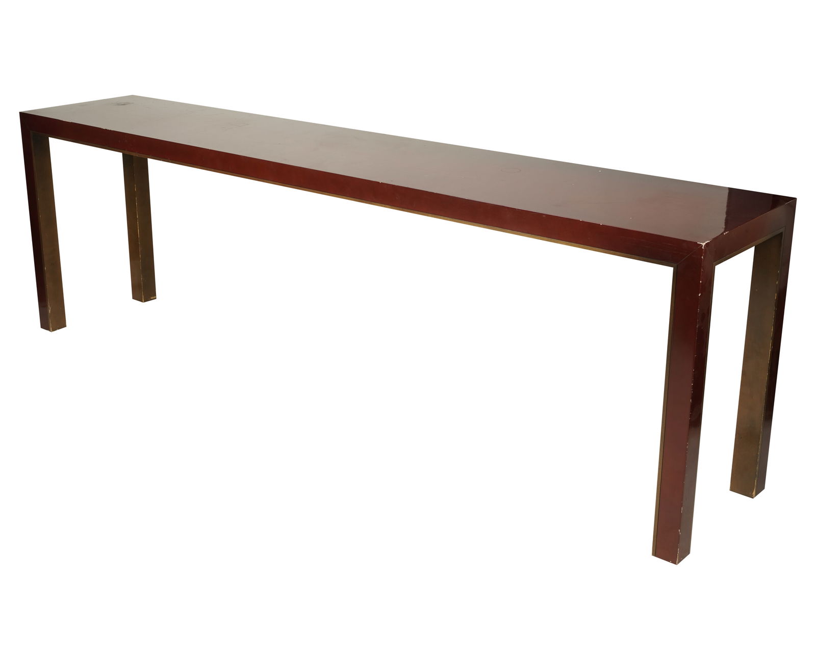 A Red Lacquered Sofa Table: Parson's style 29 x 93 x 18 in. (73.7 x 236.2 x 45.7 cm.) Notes: This item does not qualify for in-house shipping. Please see our preferred shippers' list for quotes or arrange for local pickup. https