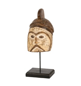 An African Carved and Painted Wood Mask